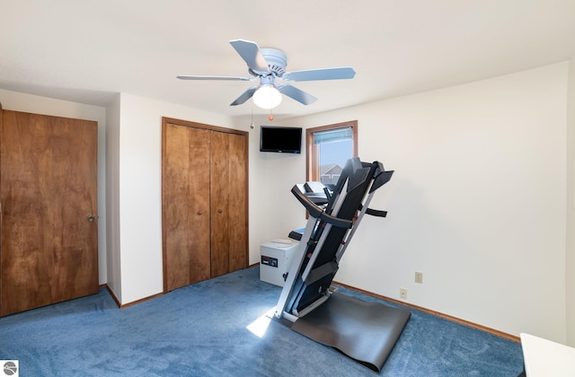 workout room featuring baseboards, carpet, and ceiling fan