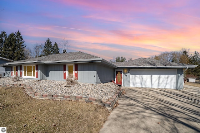 view of front of property with an attached garage and driveway