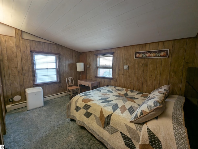 bedroom featuring lofted ceiling, baseboard heating, wood walls, and carpet flooring