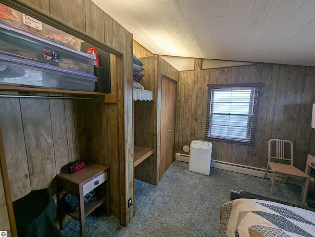 carpeted bedroom featuring lofted ceiling, wooden walls, wood ceiling, and baseboard heating