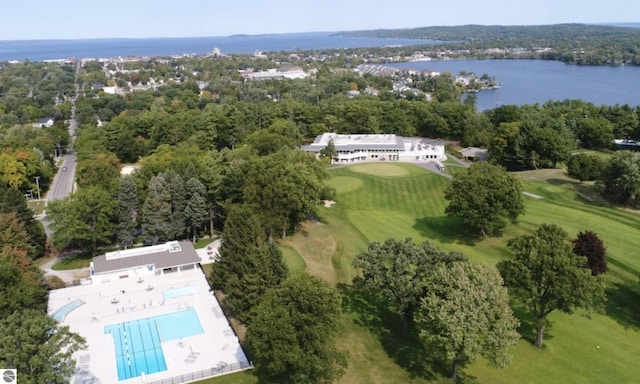 birds eye view of property featuring golf course view and a water view