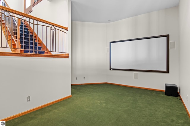 home theater with carpet flooring and baseboards