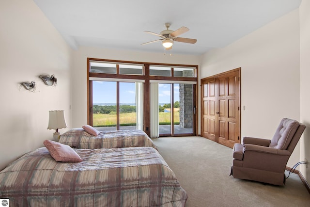 carpeted bedroom featuring a ceiling fan and access to outside