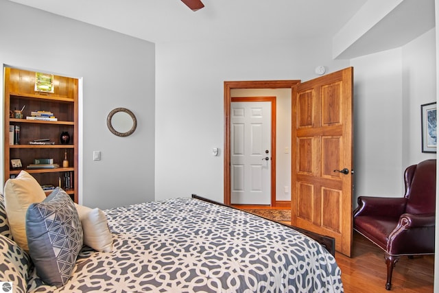 bedroom featuring wood finished floors and ceiling fan