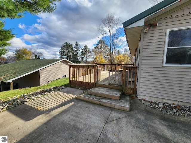 deck featuring a patio area