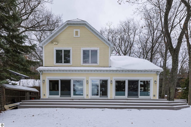 view of snow covered property