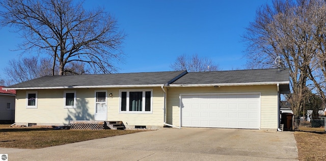 single story home with crawl space, concrete driveway, and an attached garage