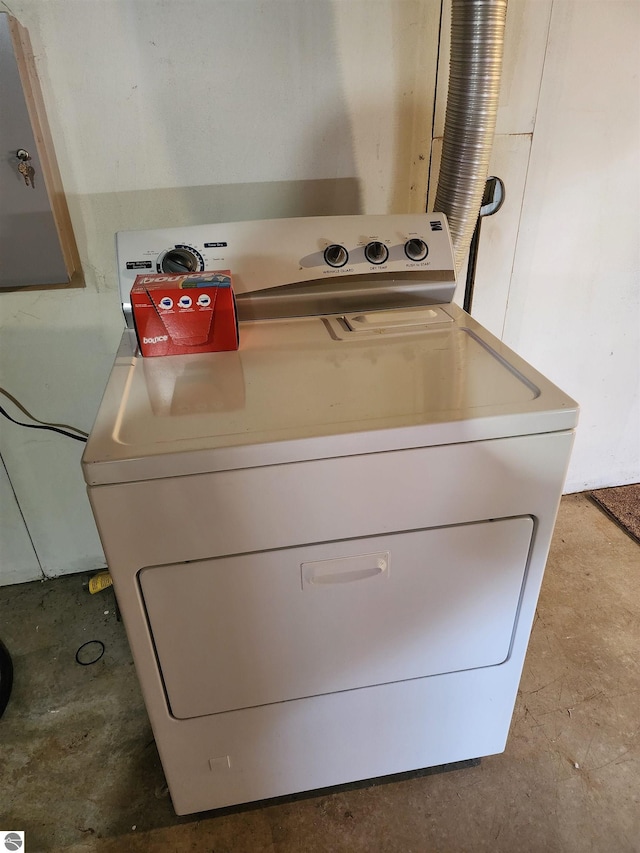 clothes washing area featuring laundry area and washer / dryer