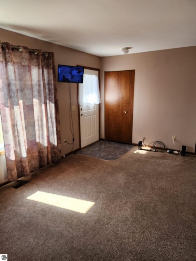 spare room with carpet