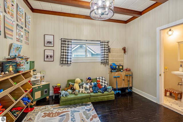 rec room with baseboards, beam ceiling, a chandelier, and hardwood / wood-style flooring