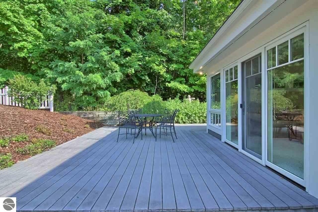 deck featuring outdoor dining space