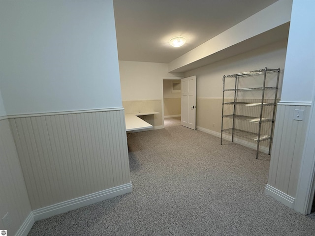 spacious closet with carpet flooring