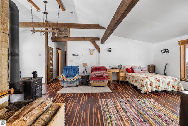 bedroom featuring lofted ceiling with beams, wood finished floors, and a wood stove