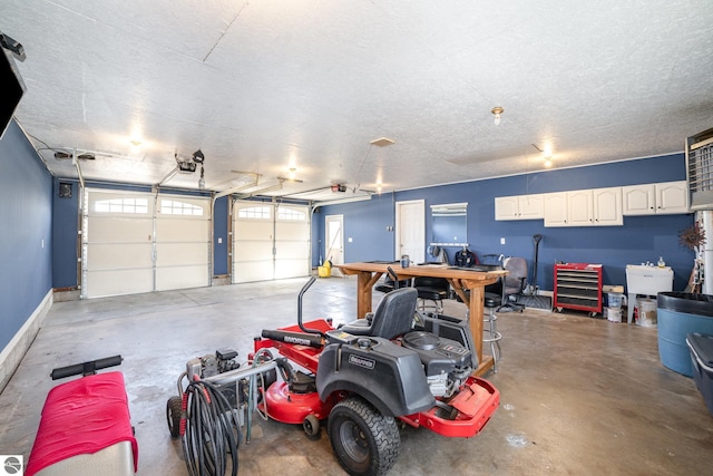 garage featuring baseboards