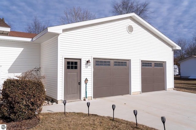 garage with driveway