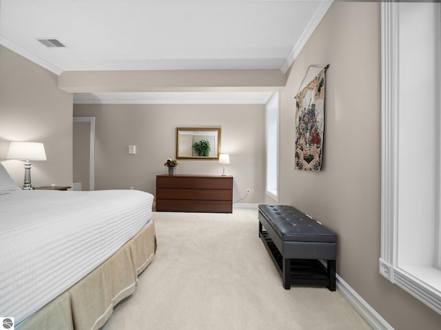 bedroom with visible vents, baseboards, light colored carpet, and ornamental molding