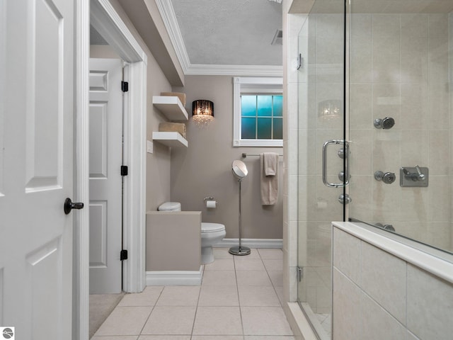 bathroom with baseboards, a stall shower, ornamental molding, tile patterned flooring, and toilet