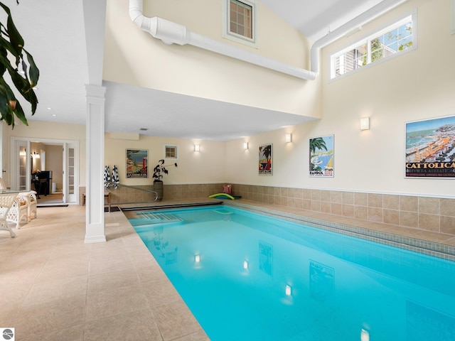 indoor pool with decorative columns