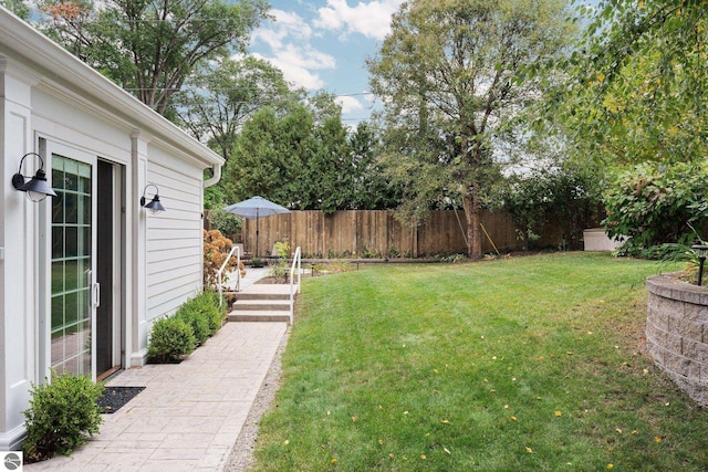 view of yard featuring fence