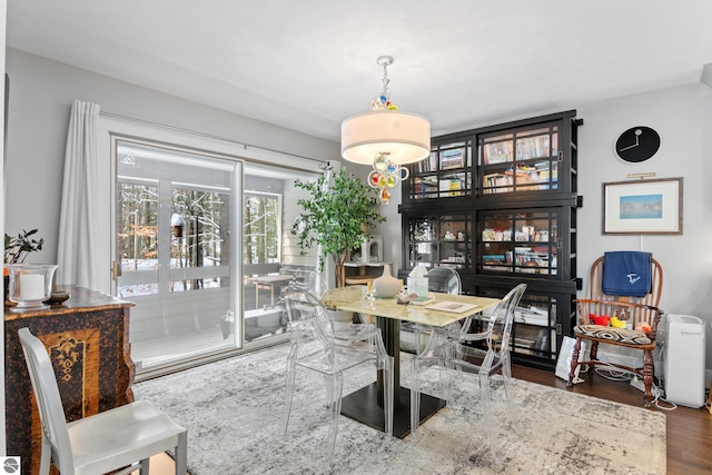 dining area featuring wood finished floors