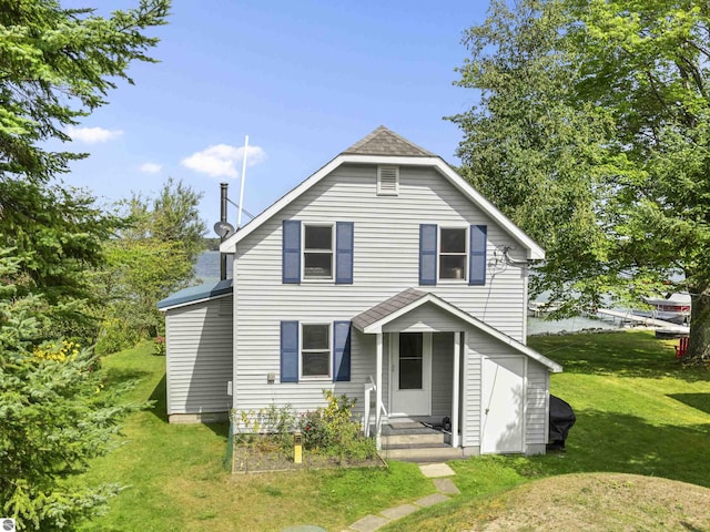 view of front of property with a front yard