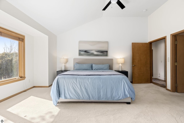 bedroom featuring lofted ceiling, carpet, baseboards, and ceiling fan