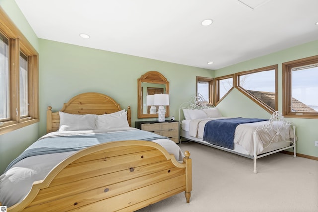 carpeted bedroom with recessed lighting and baseboards