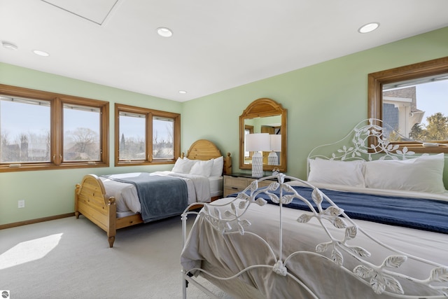 carpeted bedroom with recessed lighting and baseboards