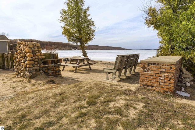 view of yard with a water view