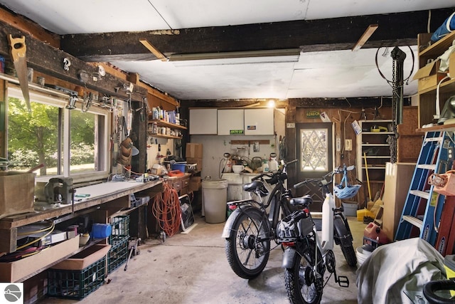 garage with a workshop area