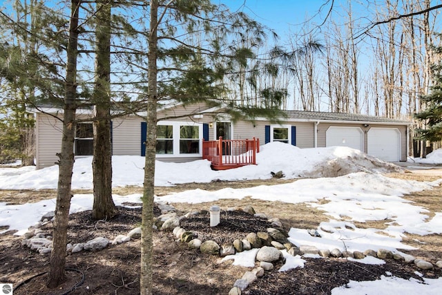 single story home featuring a garage