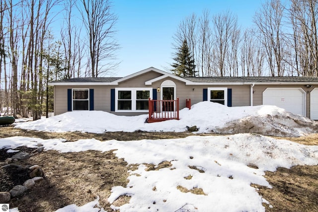 view of front of property with a garage