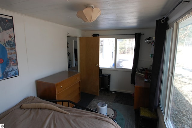 bedroom with radiator heating unit