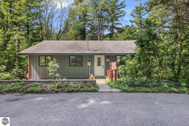 view of front of home with covered porch and board and batten siding