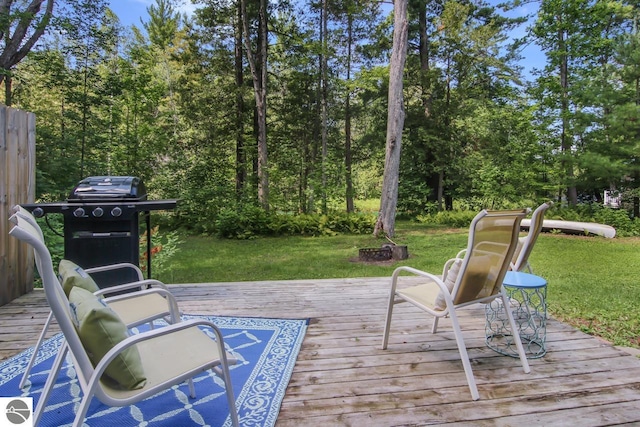 wooden deck with a yard