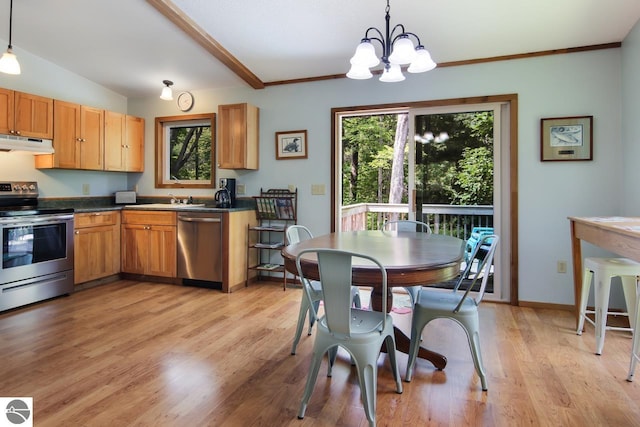 kitchen featuring light wood finished floors, stainless steel appliances, under cabinet range hood, dark countertops, and a chandelier