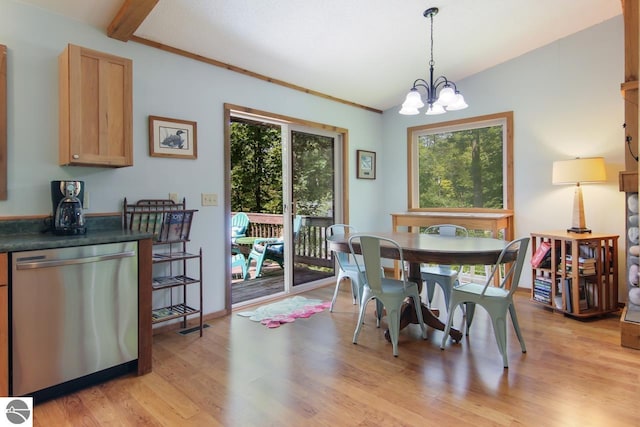 dining room with light wood-type flooring, an inviting chandelier, and beamed ceiling