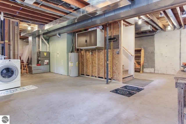 unfinished below grade area featuring heating unit, washer / clothes dryer, electric water heater, and stairs