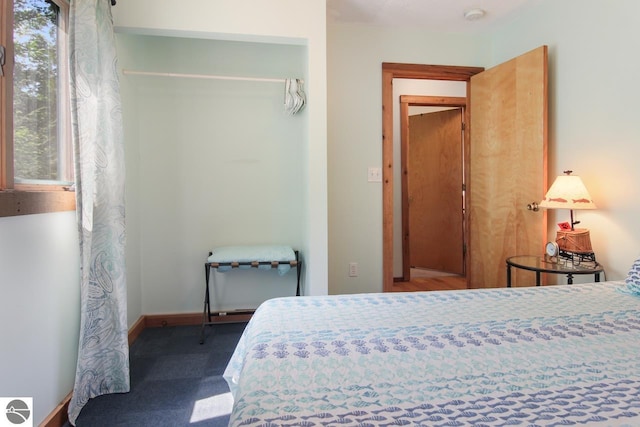 bedroom featuring baseboards