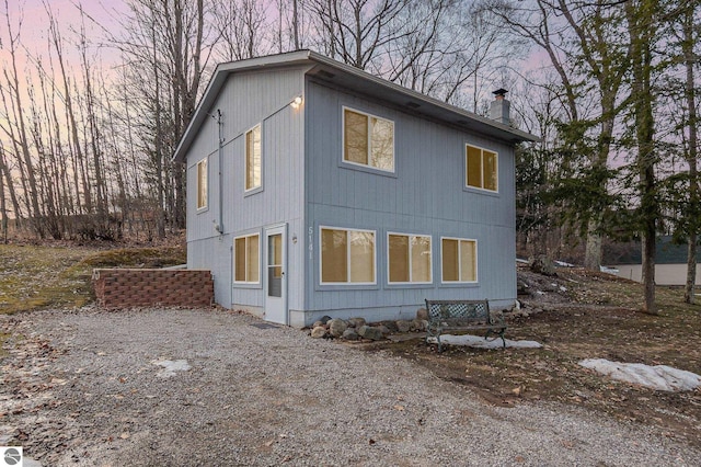 exterior space featuring a chimney