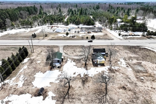 bird's eye view featuring a view of trees