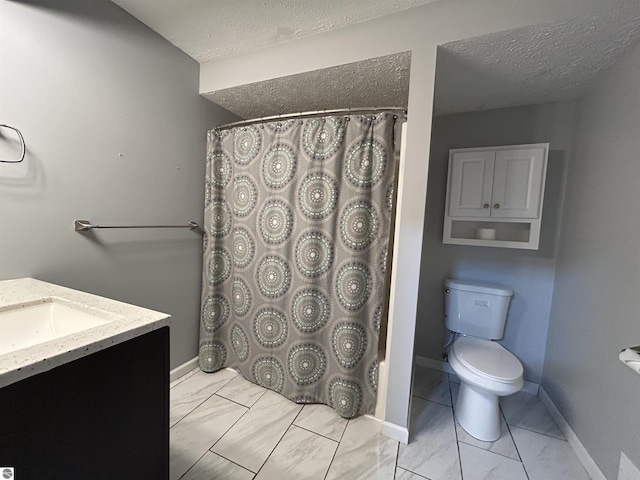 bathroom with vanity, a shower with shower curtain, baseboards, a textured ceiling, and toilet