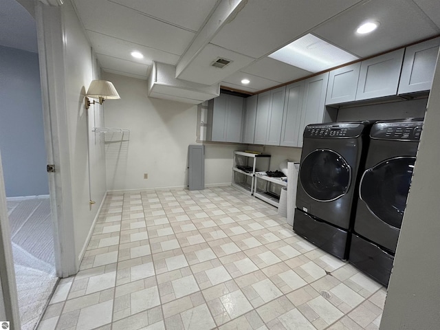 laundry room featuring visible vents, recessed lighting, cabinet space, baseboards, and washing machine and clothes dryer