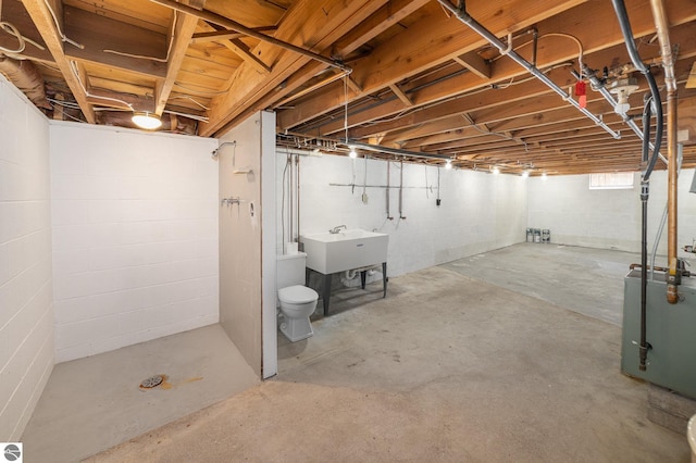 basement featuring a sink