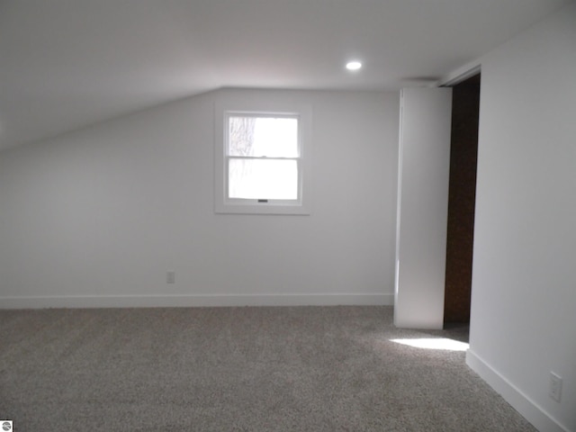 4177 Seminole St, Gladwin, MI 48624 - bonus room featuring carpet floors, baseboards, vaulted ceiling, and recessed lighting