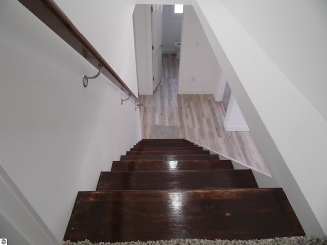 4177 Seminole St, Gladwin, MI 48624 - stairs featuring wood finished floors