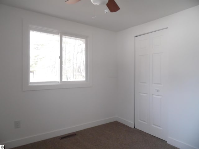 4177 Seminole St, Gladwin, MI 48624 - carpeted spare room with a ceiling fan and baseboards