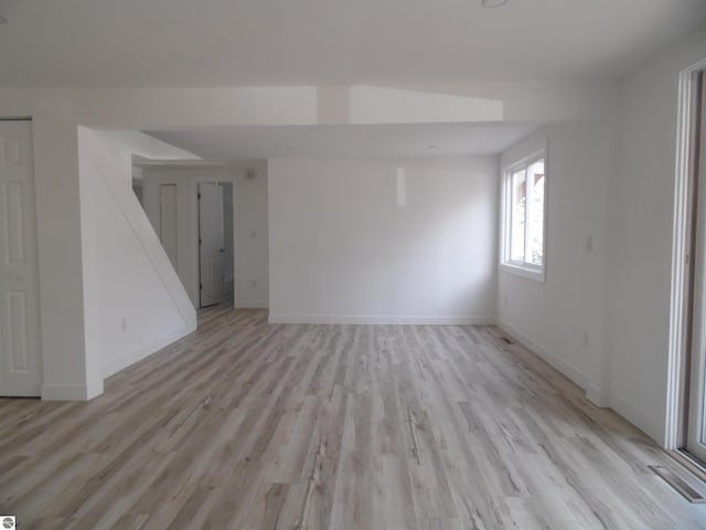 4177 Seminole St, Gladwin, MI 48624 - empty room with light wood finished floors and baseboards