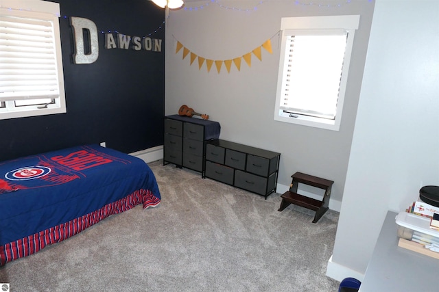 5661 Golfridge Rd, Alma, MI 48801 - carpeted bedroom with baseboards