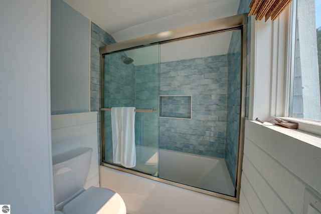4781 E Golfview Dr, Leland, MI 49654 - full bath with vanity, enclosed tub / shower combo, and toilet